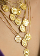 18kt Gold Taurus Horoscope Pendant on Cord