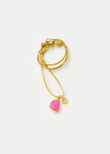 18kt Gold Ruby & Flower Amulets on Cord