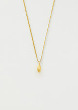 18kt Gold Seed Pendant on Cord