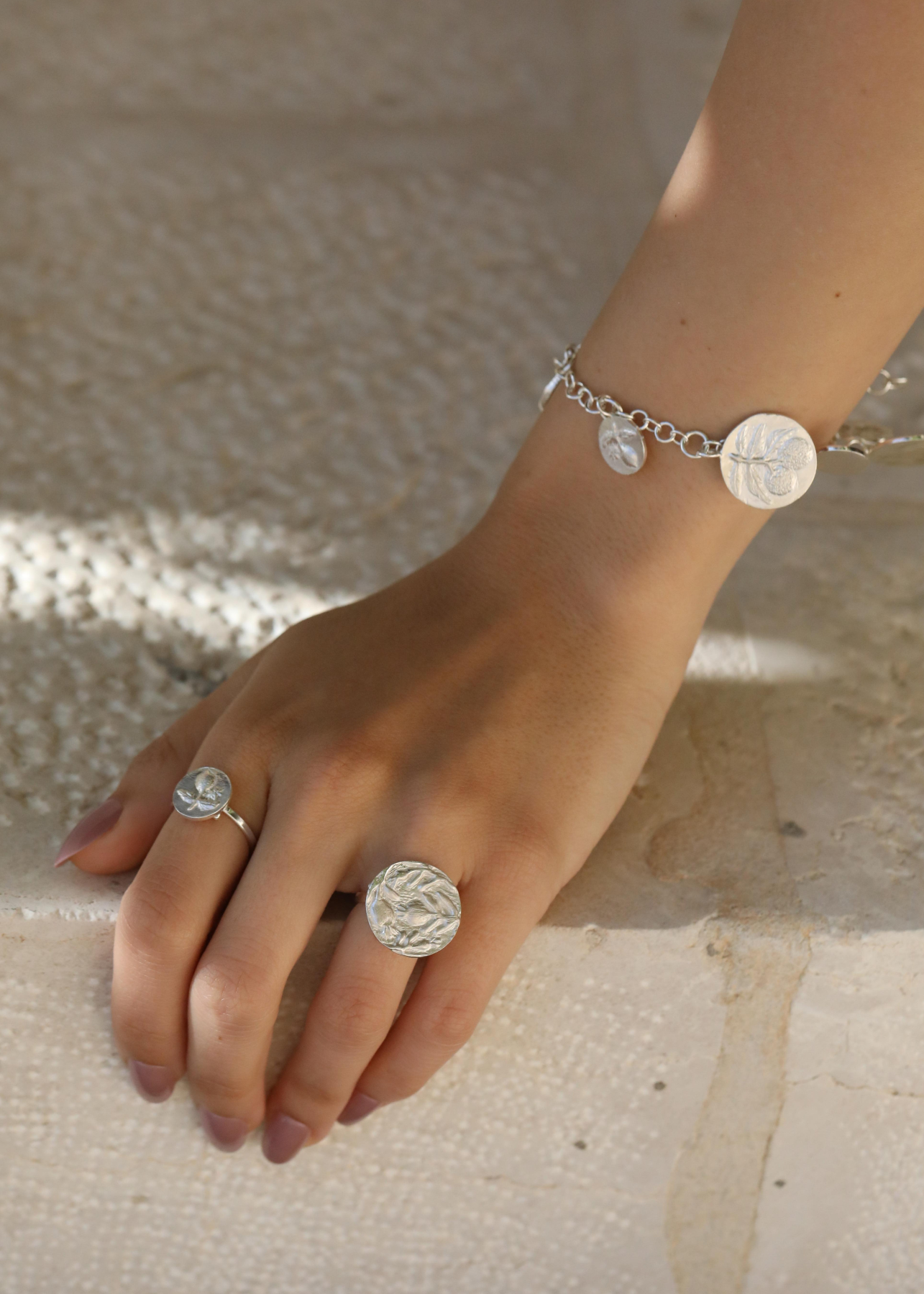 Model Wearing Sterling Silver Next Generation Charms Bracelet