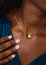 18kt Gold Peridot & Flower Amulets on Cord