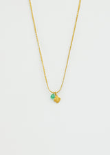 18kt Gold Anemone & Tiny Emerald Amulet on Cord