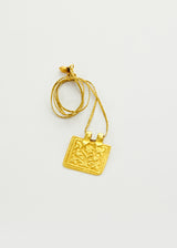 18kt Gold Flower & Bird Amulet On Cord