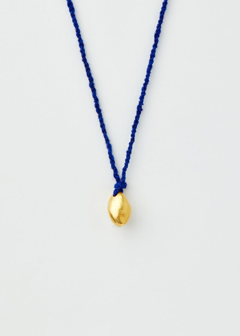 18kt Gold Bolivian Pebble on Blue Alpaca Wool Necklace