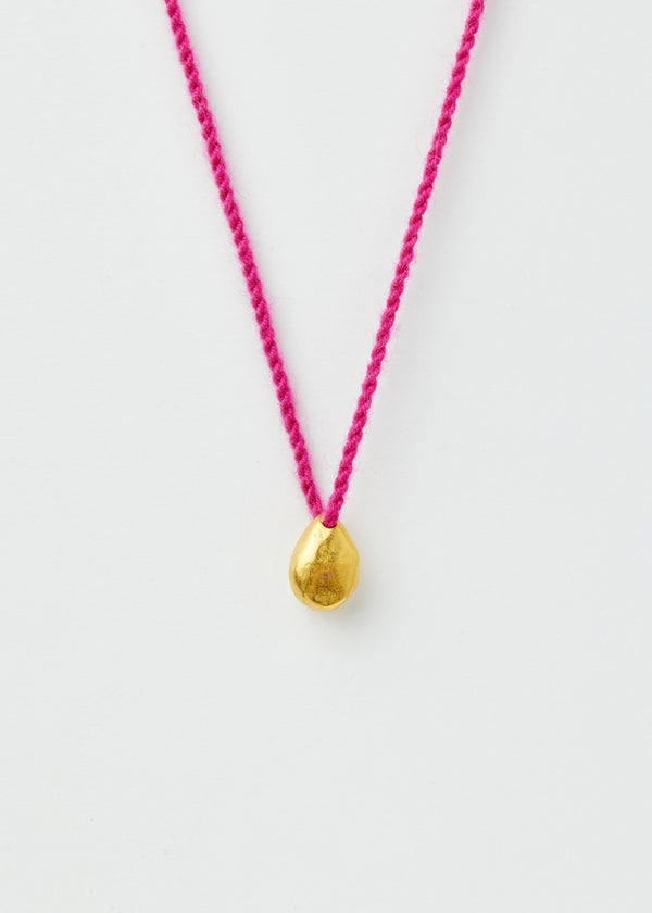 18kt Gold Bolivian Round Pebble on Pink Alpaca Wool Necklace