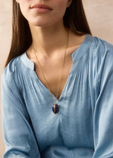 18kt Gold Parcel Set Lapis Seed Amulet on Cord