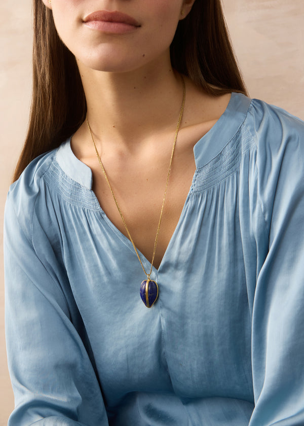 18kt Gold Parcel Set Lapis Seed Amulet on Cord