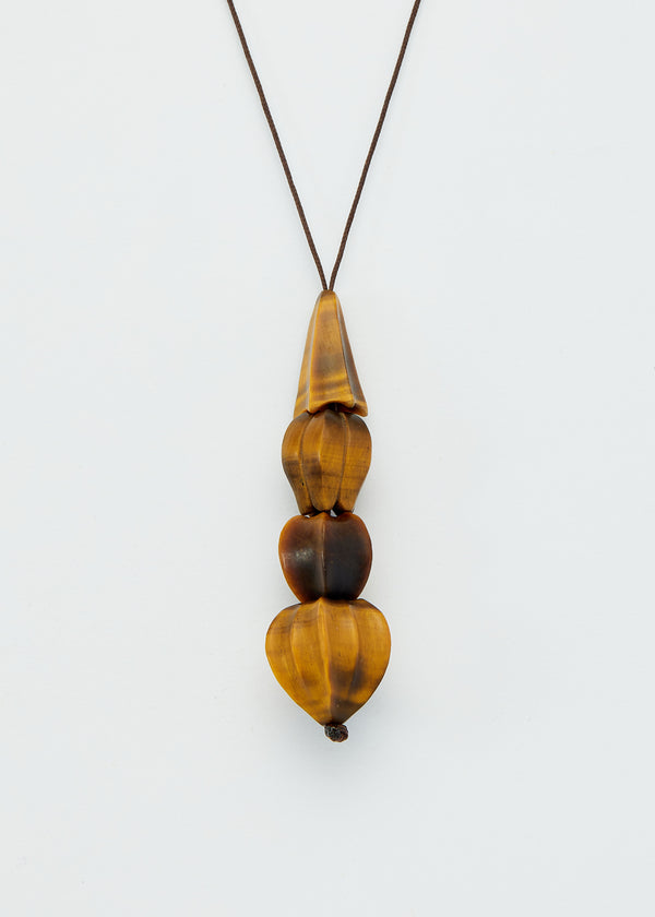 Carved Progeny Tiger's Eye Four Drop Amulet on Cord