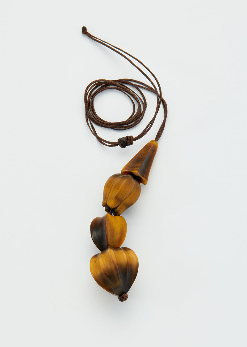 Carved Progeny Tiger's Eye Four Drop Amulet on Cord